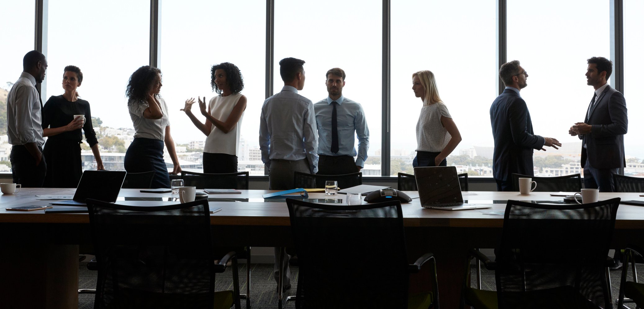 Businesspeople Chatting in the Boardroom